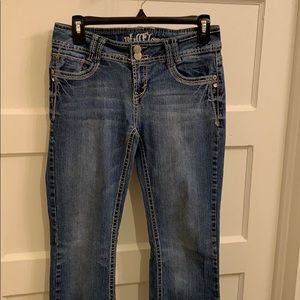 Boot cut blue jeans.